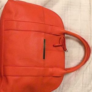 Tangerine colored purse